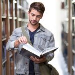 college student, library, man-3500990.jpg